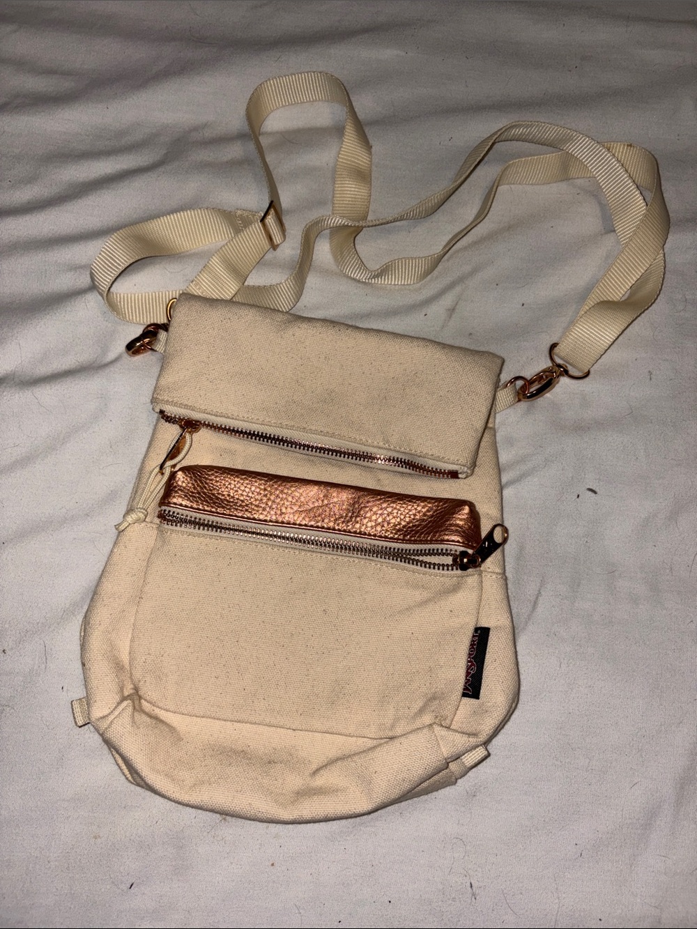 Jansport Canvas Crossbody Bag with Metallic Accent Adjustable Straps - Cream